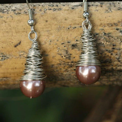 Elegant intellectual pearl earrings with large pearls as a gift for her