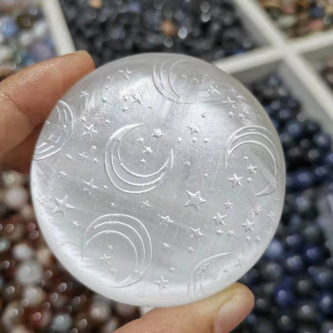 Natural selenite round moon and star pattern