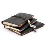 Black magic runes notebook charka blending with natural crystal column