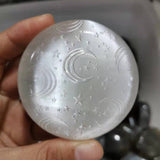 Natural selenite round moon and star pattern