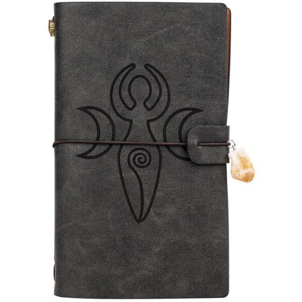 Black magic runes notebook charka blending with natural crystal column