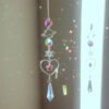 Elegant Suncatcher Crystal Wind Chime with Star, Moon, and Diamond Design - Hanging Prisms for Rainbow Light Effects - Decorative Pendant for Home and Garden
